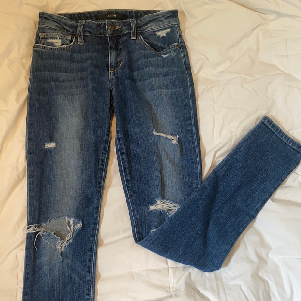 Joe’s ripped blue Jeans